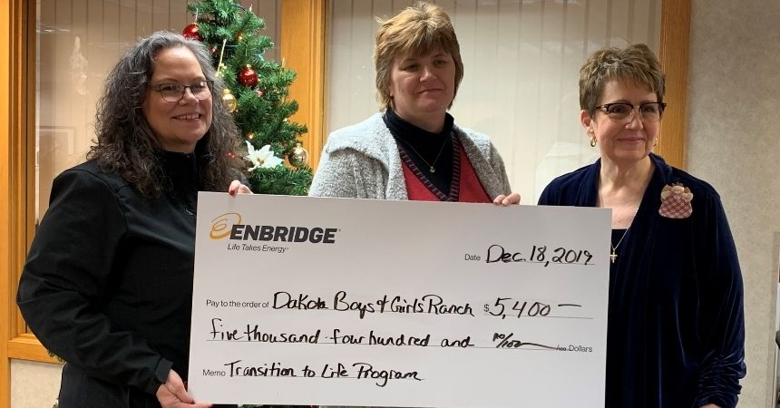 Enbridge donated $5,400 for a Minot DMS Transition to Life Program