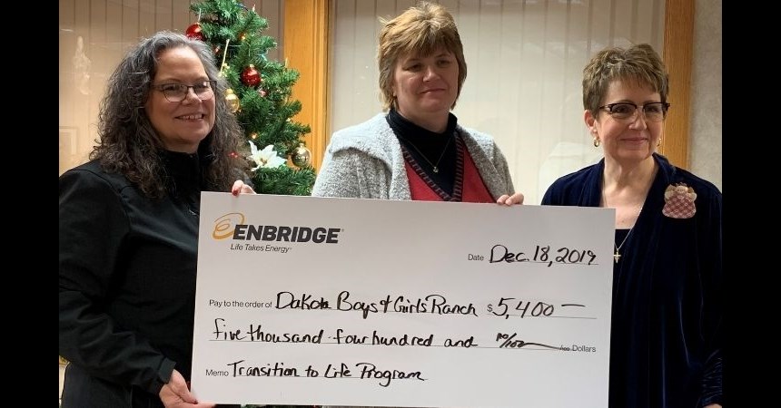 Enbridge donated $5,400 for a Minot DMS Transition to Life Program