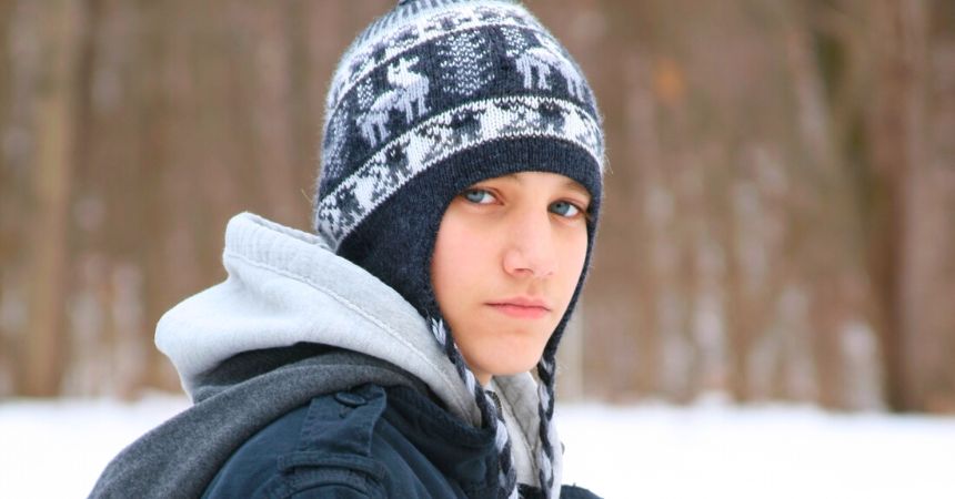 Wearing a Winter Coat on a Florida Beach